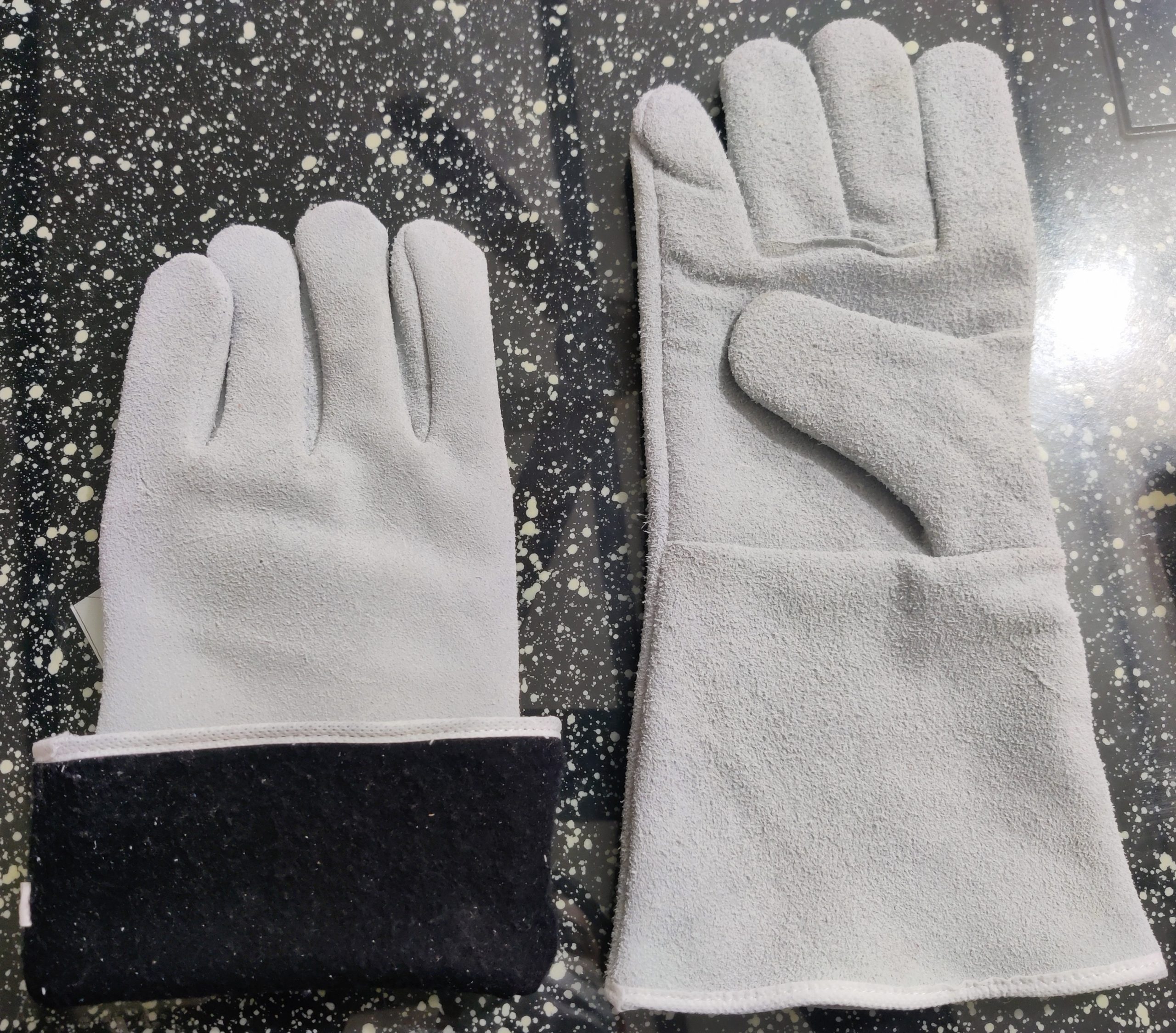 Leather hand gloves for welding work