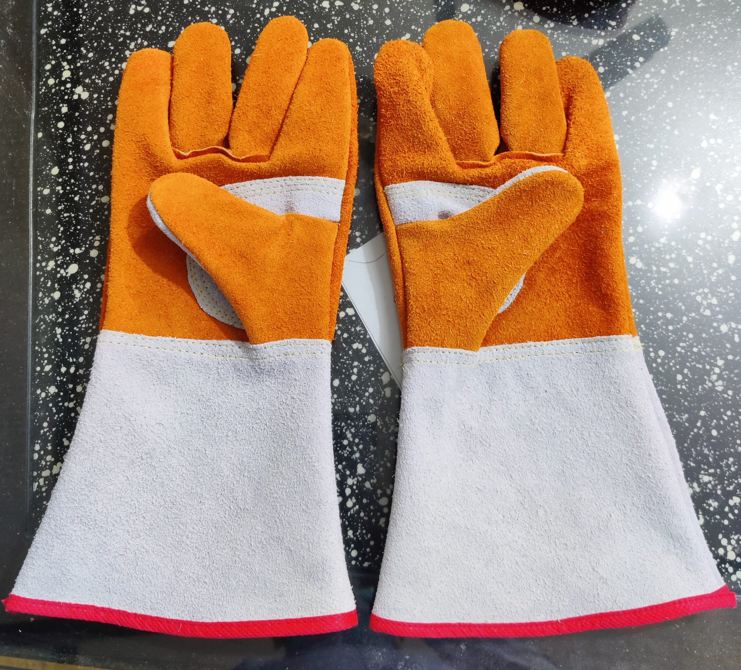 Industrial leather hand gloves manufacturer